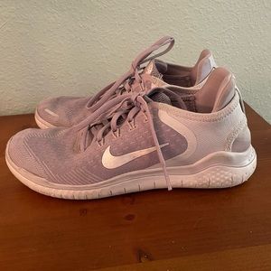 Blush Nike tennis shoe